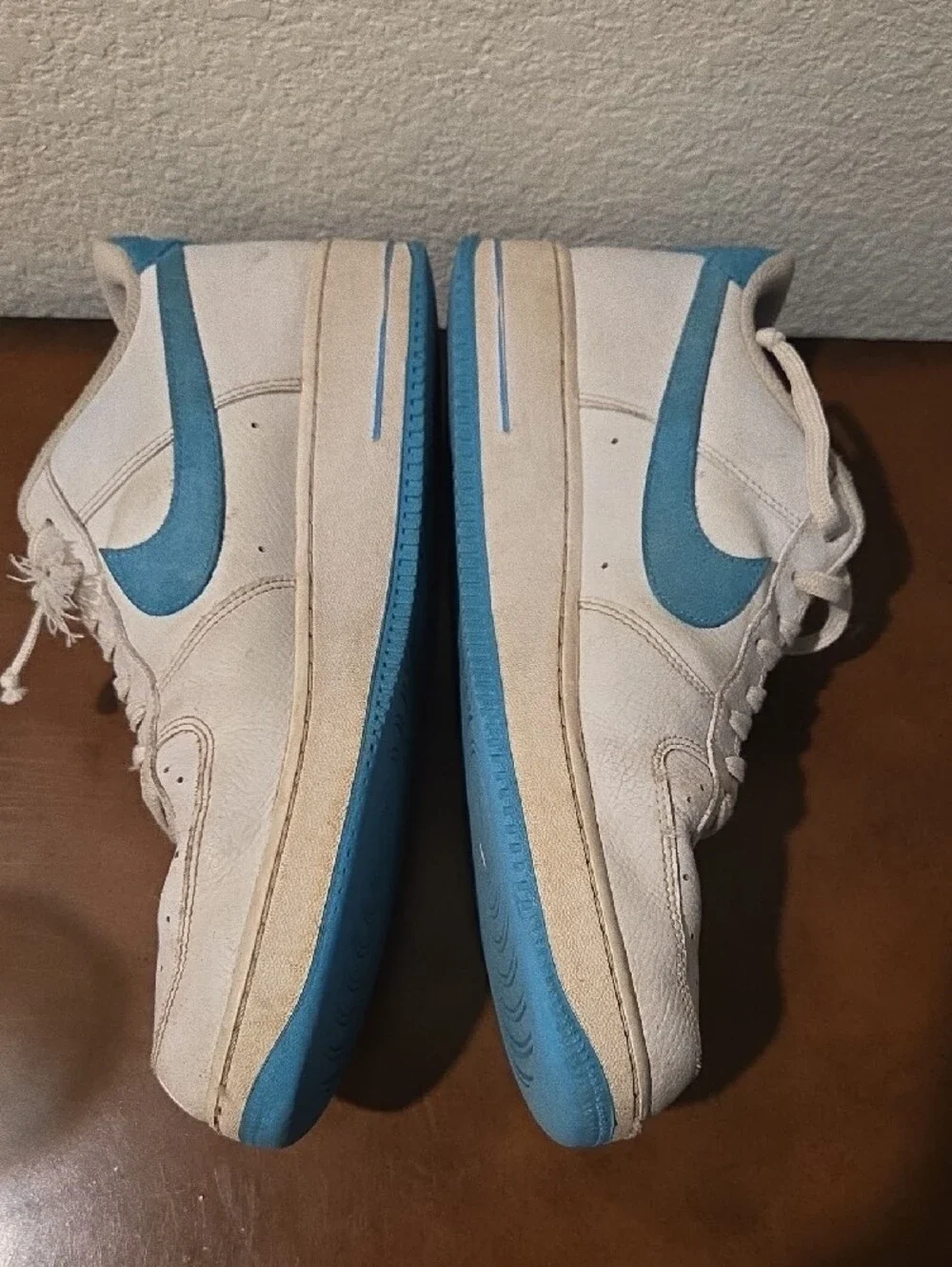 Nike AIR FORCE 1 White and Light Blue Low-Top Sneakers with Cartoon Graphic